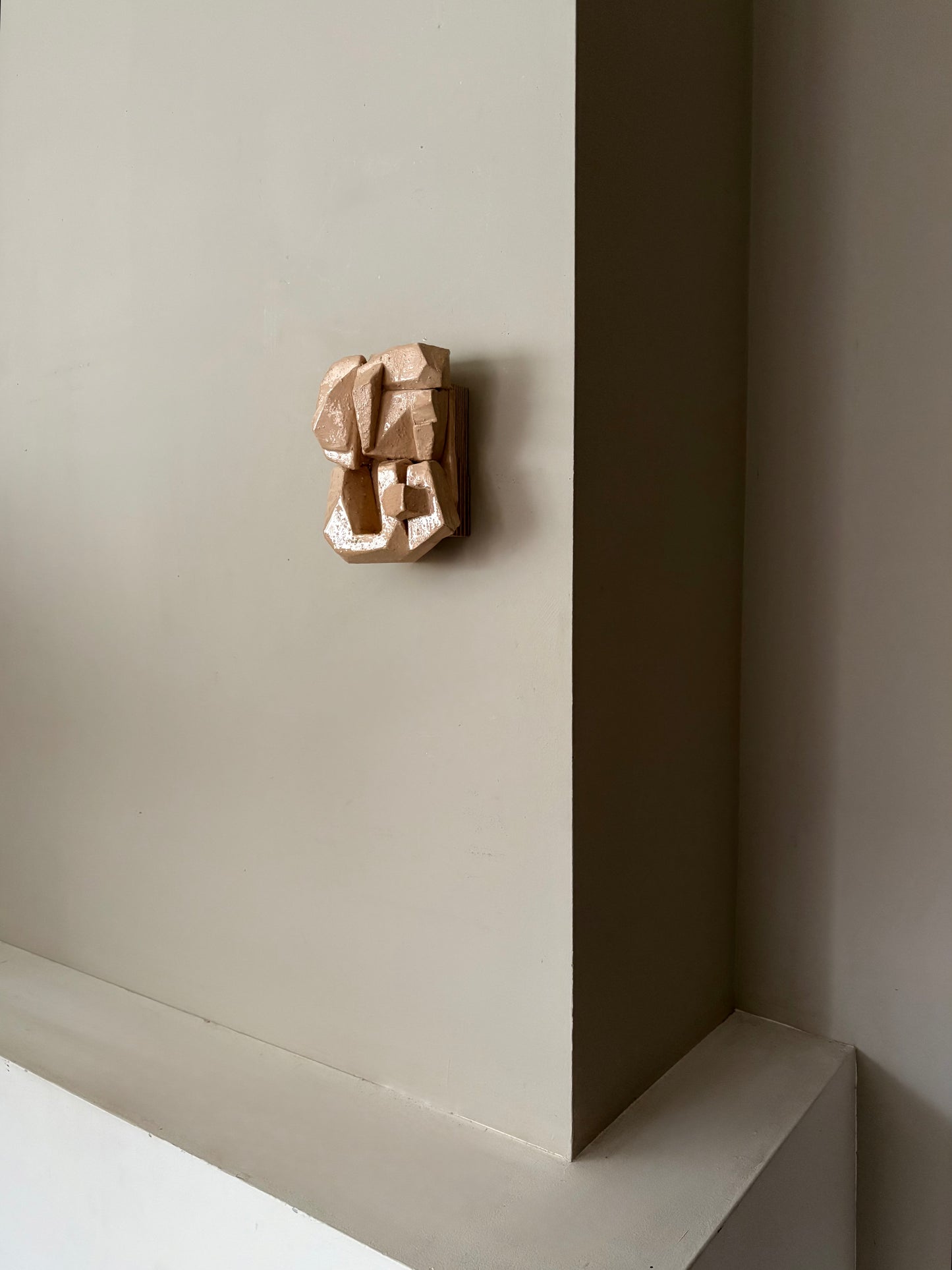 Carved wall sculp light